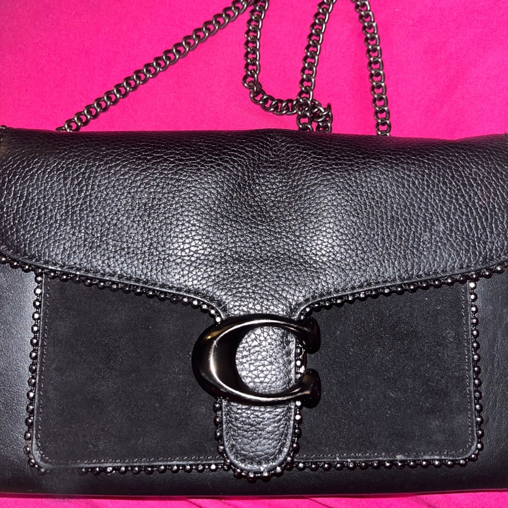Coach purse with chain strap.
